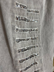 Stretch-housut reilulla mitoituksella, paljettikoristeiset lahkeet, korkea kuminauhavyötärö, taskut, kapeneva lahje