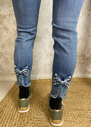 Farkku mapp bow helmirusetti vaalea kulutettu