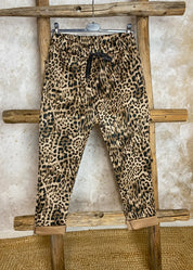 Naisten joustavat stretch-housut, korkea vyötärö, kuvioitu kangas, kapeneva lahje ja taskut – mukavat ja tyylikkäät.