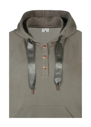 Pitkä khakinvihreä huppari pehmeästä collegekankaasta, suora malli, nepparit edessä, halkiot helmassa ja kengurutasku.