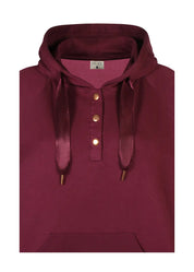 Pitkä viininpunainen huppari pehmeästä collegekankaasta, suora malli, nepparit edessä, halkiot helmassa ja kengurutasku.