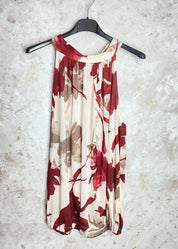 Rento hihaton toppi naisille, isot kukkakuviot, solmittavat nauhat, koristeleikkaus, joustava ja kevyt materiaali.