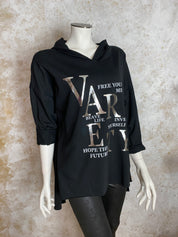 Naisten hupparitunika printillä, pehmeä joustava materiaali, A-linja, pidempi takaa, pitkät hihat ja laskettu olkalinja