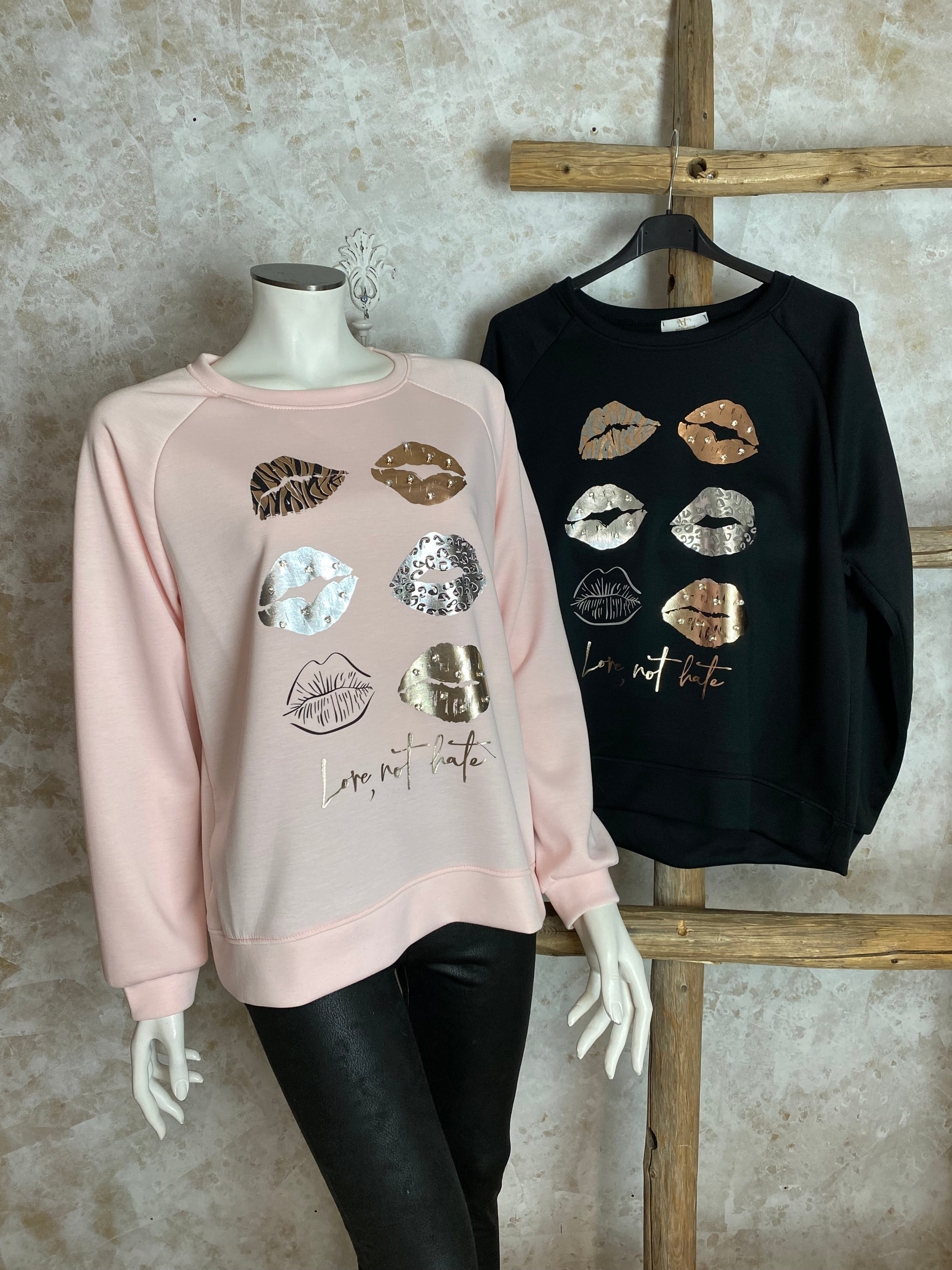 Naisten näyttävä collegepaita, pehmeä joustava materiaali, strassikoristeltu huulet-kuviointi, suora malli, pitkät hihat ja O-pääntie