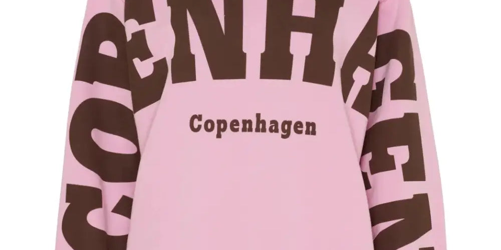 Pinkki oversized collegepaita printtikuviolla, pehmeä ja joustava materiaali, pitkät hihat ja O-pääntie