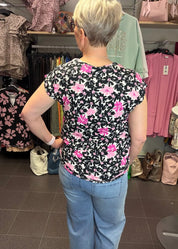 Naisten pinkki trikoopaita, pehmeä ja joustava materiaali, holkkihihat, O-pääntie ja pussimainen helma