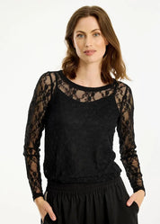 Naisellinen pitkähihainen pitsipaita, joustava ja läpikuultava yläosa arkeen ja juhlaan, klassinen O-pääntie.